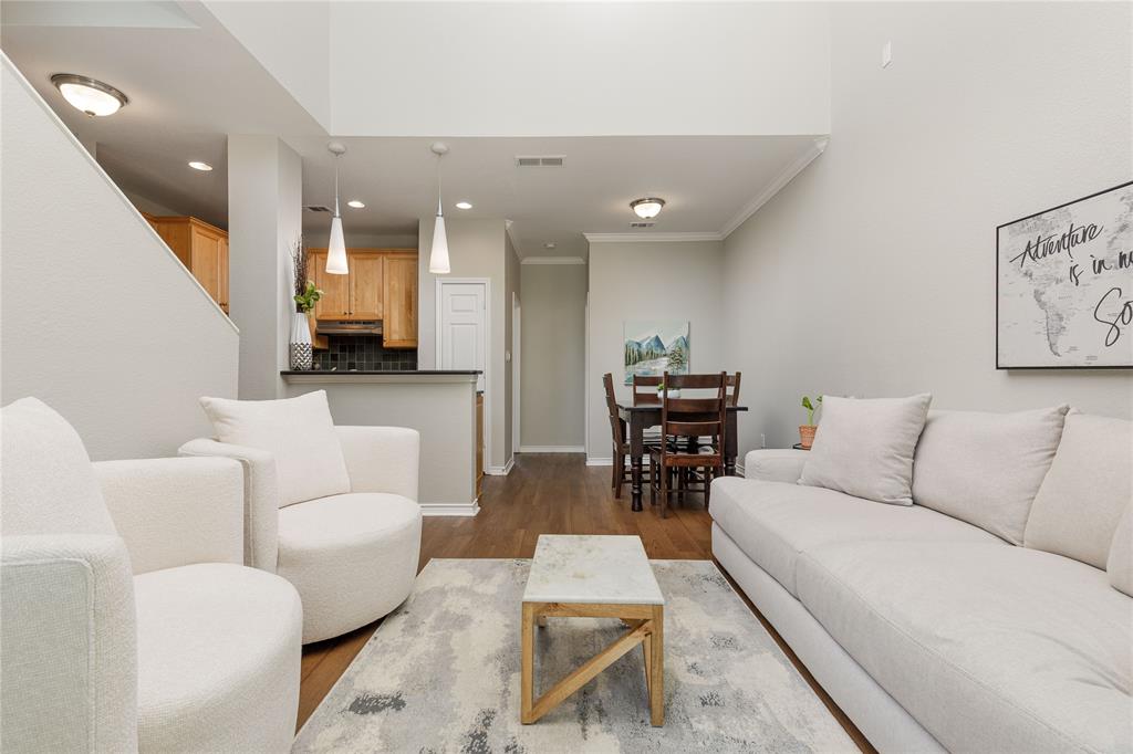 2104 Azure Pointe Richardson, TX 75080 - Photo 4 of 28 a living room with furniture and a wooden floor