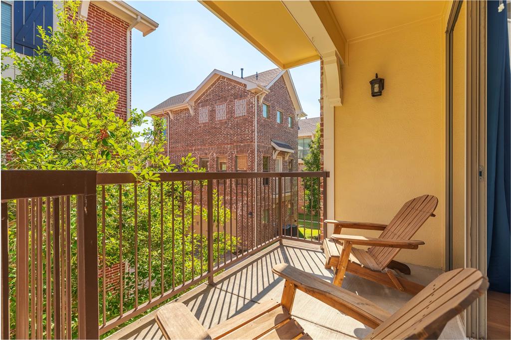 2104 Azure Pointe Richardson, TX 75080 - Photo 5 of 28 a view of balcony with two chairs and a potted plant