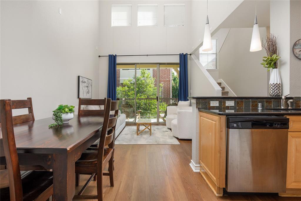 2104 Azure Pointe Richardson, TX 75080 - Photo 10 of 28 a living room with a table chairs and a potted plant