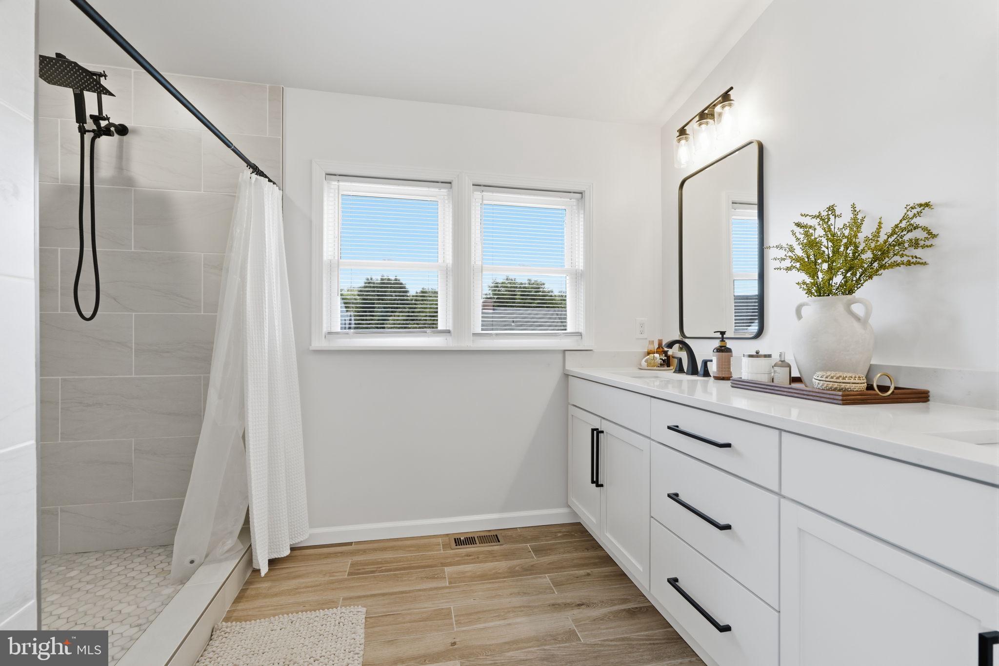 9337 Andover Road Philadelphia, PA 19114 - Photo 26 of 33 Bright and airy modern bathroom retreat.