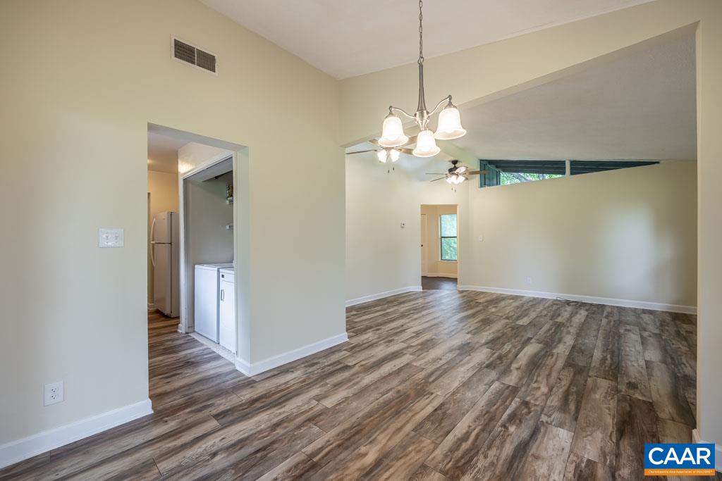 528 Matthew Mill Road Ruckersville, VA 22968 - Photo 11 of 27 a view of a livingroom with a chandelier