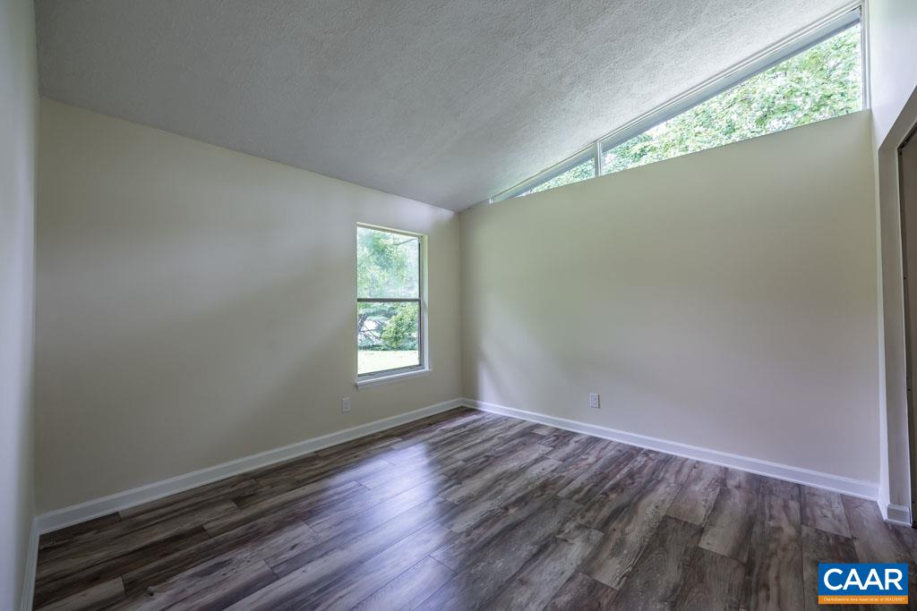 528 Matthew Mill Road Ruckersville, VA 22968 - Photo 18 of 27 a view of an empty room with a window