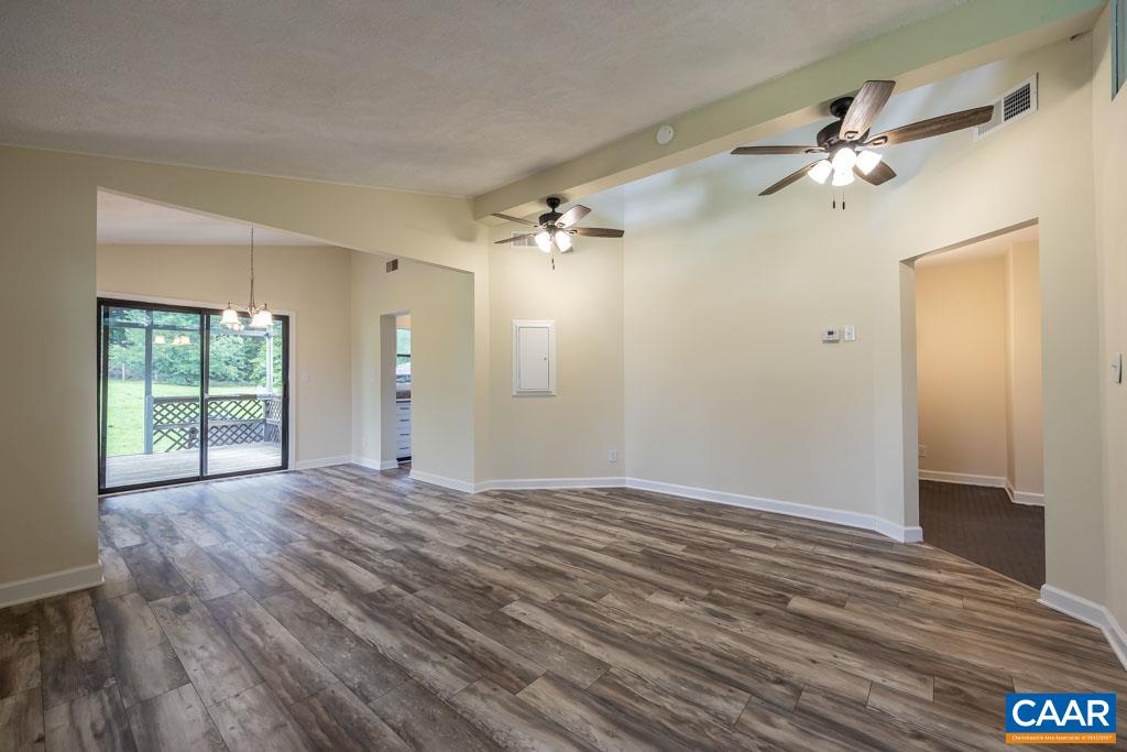 528 Matthew Mill Road Ruckersville, VA 22968 - Photo 2 of 27 a view of a livingroom with a ceiling fan and window