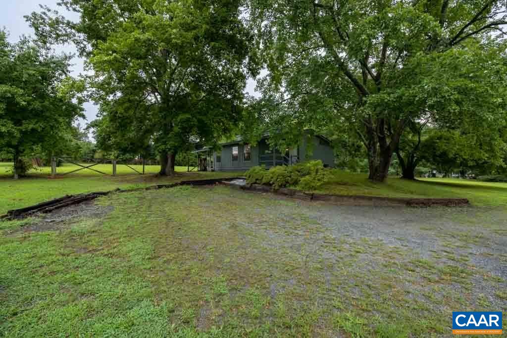 528 Matthew Mill Road Ruckersville, VA 22968 - Photo 24 of 27 a view of outdoor space with deck and yard