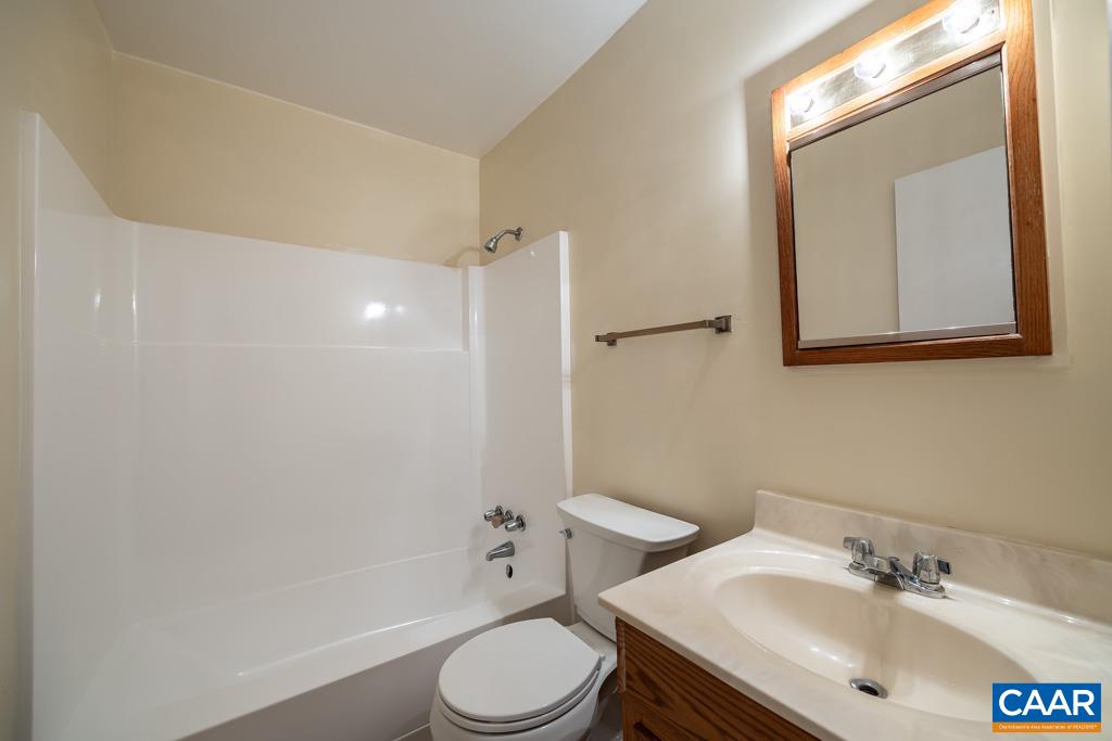 528 Matthew Mill Road Ruckersville, VA 22968 - Photo 6 of 27 a bathroom with a sink toilet and shower