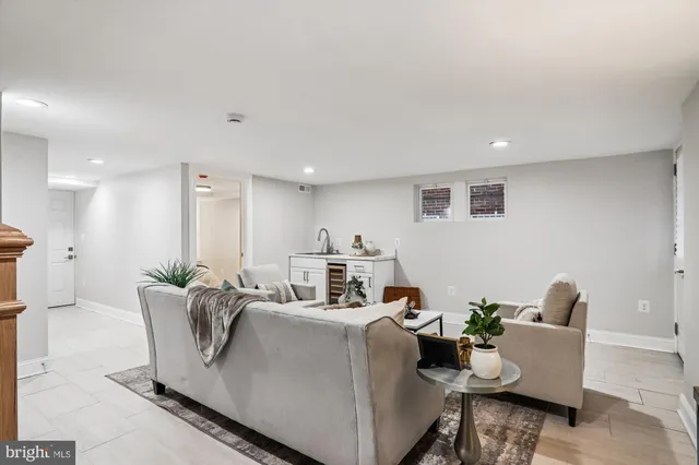 a living room with furniture and a couch