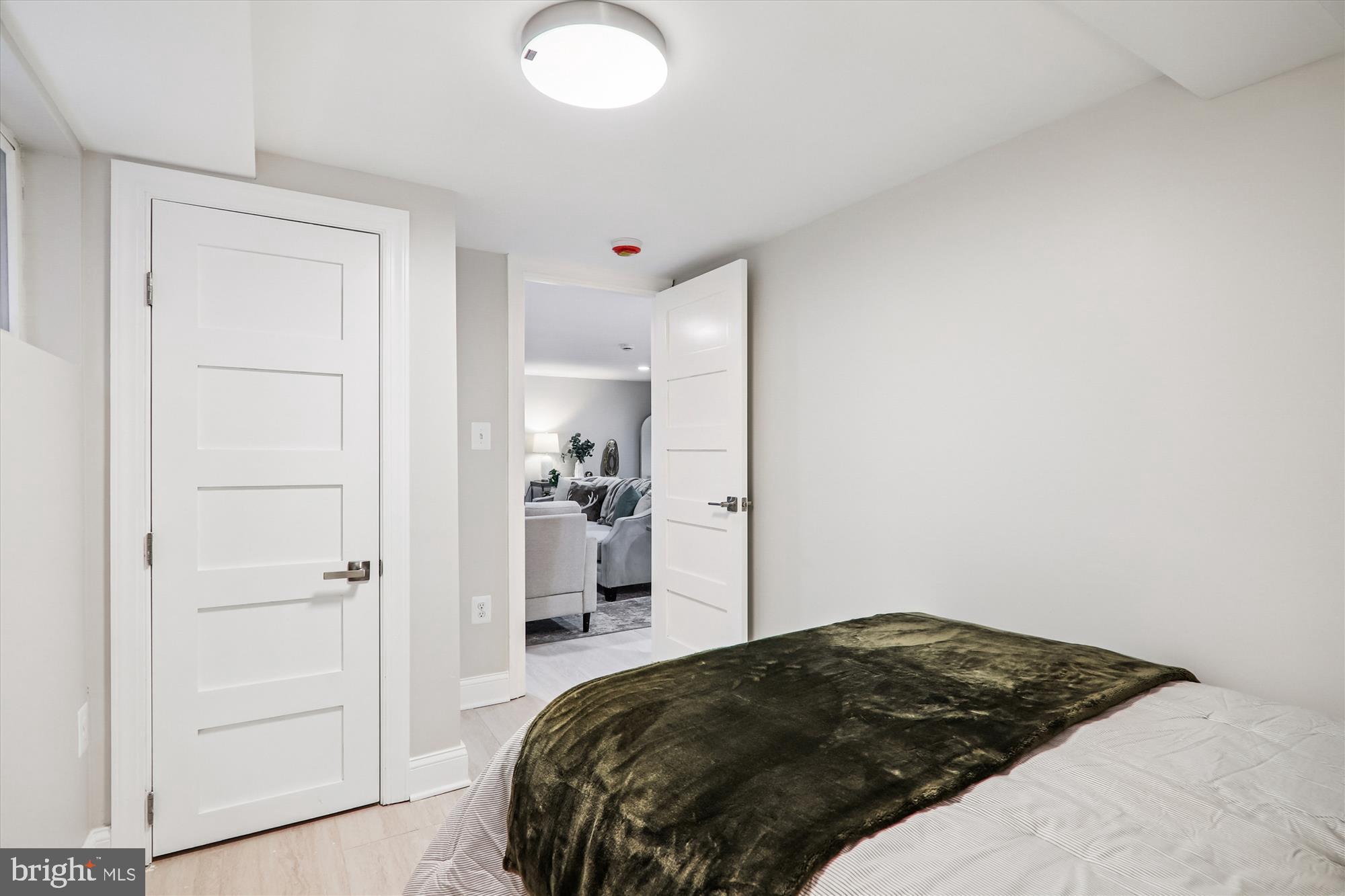 1374 Rittenhouse Street Northwest Washington, DC 20011 - Photo 26 of 30 a bedroom with a bed and closet