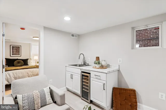 a view of living room with furniture and a couch