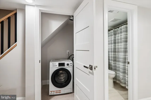 a view of bathroom and utility room