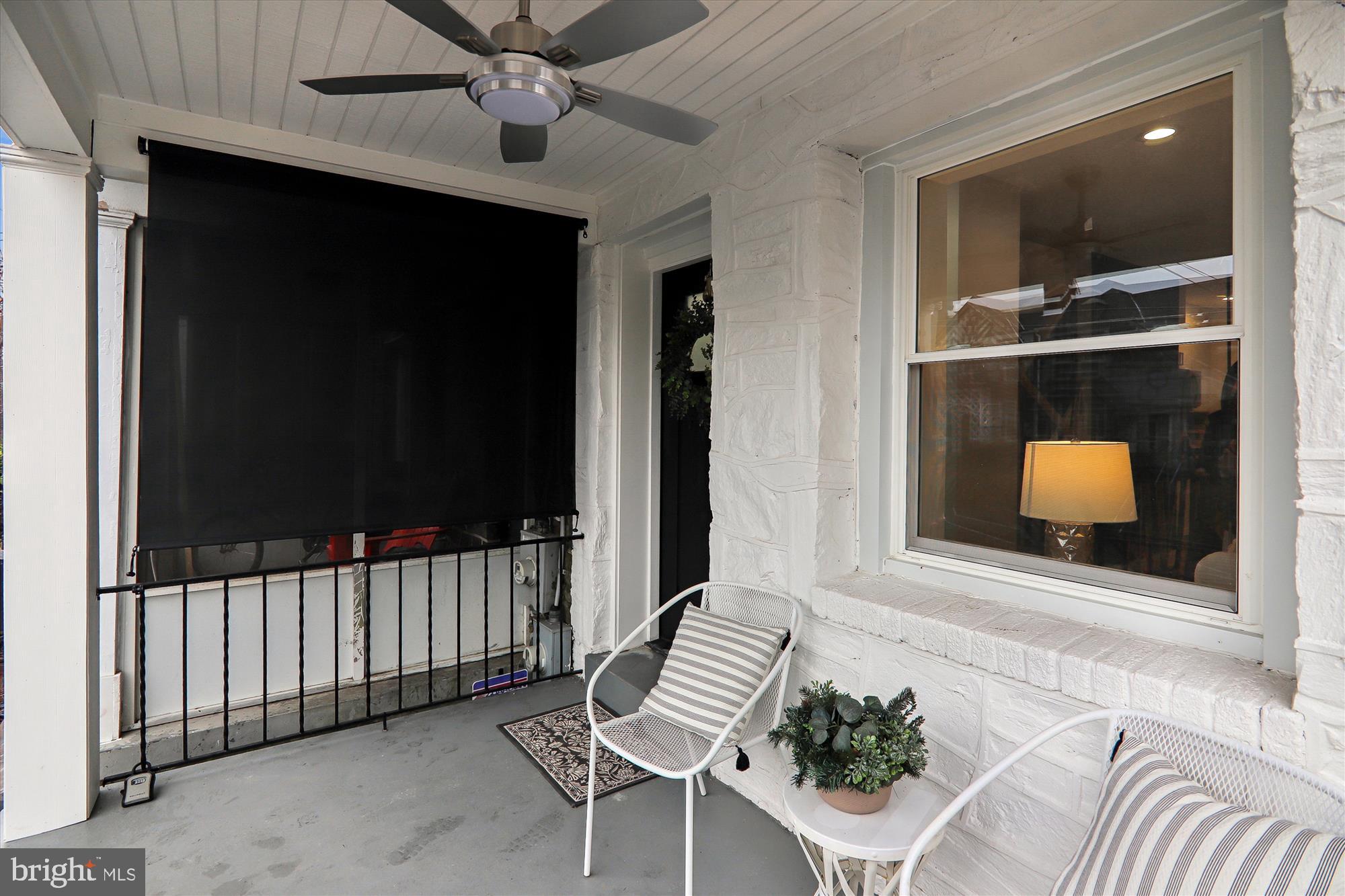 1374 Rittenhouse Street Northwest Washington, DC 20011 - Photo 29 of 30 a living room with a couch and a flat screen tv
