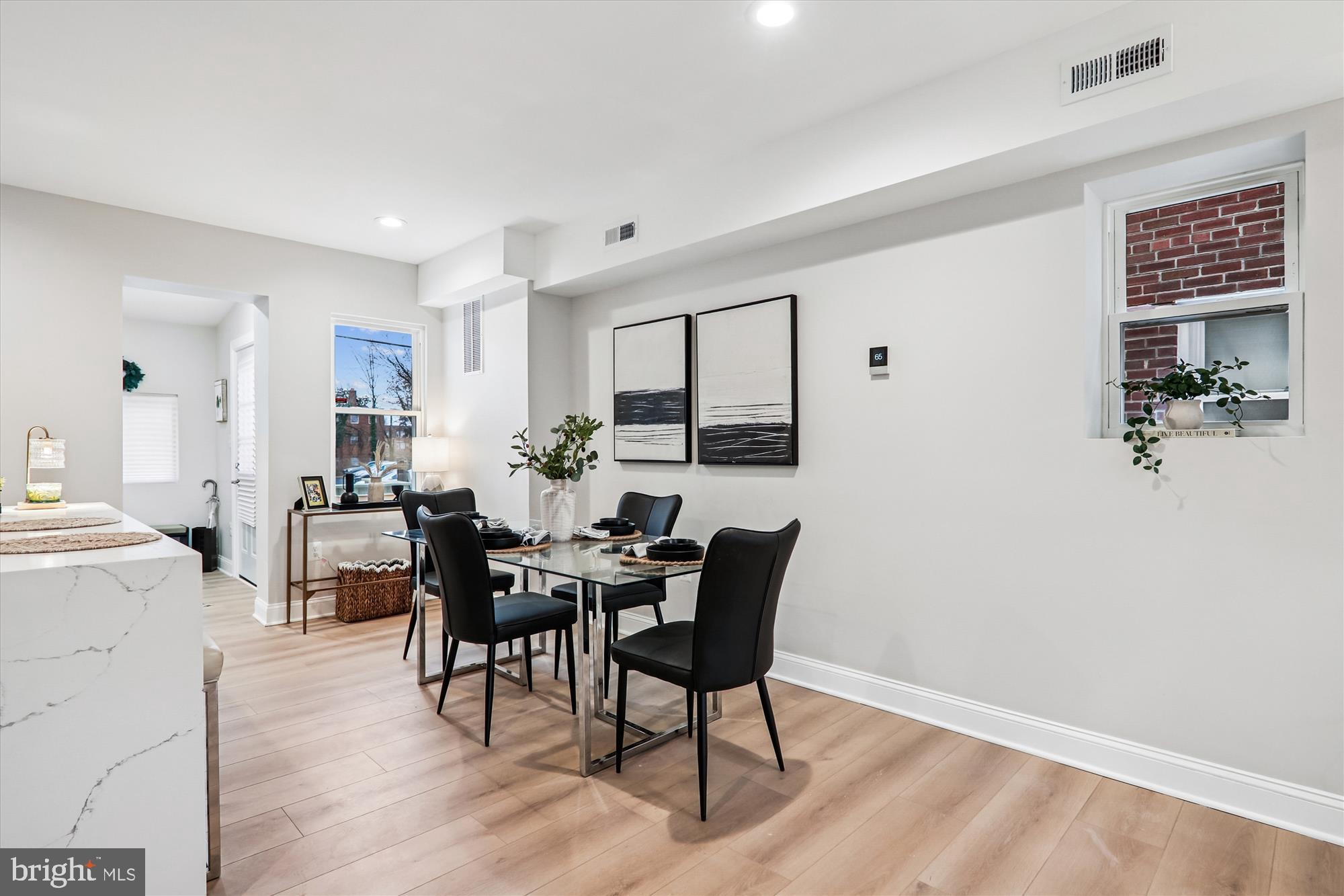 1374 Rittenhouse Street Northwest Washington, DC 20011 - Photo 9 of 30 a view of a dining room with furniture and wooden floor