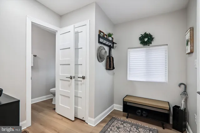 a view of room with walk in closet and window