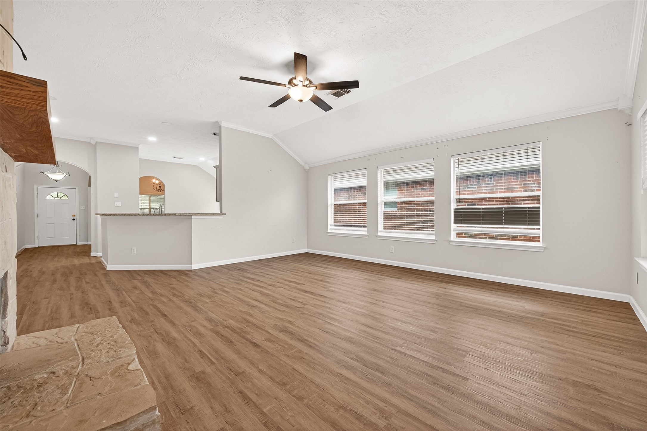 5517 Autumn Ash Lane Rosharon, TX 77583 - Photo 13 of 50 a view of wooden floor and windows in a room