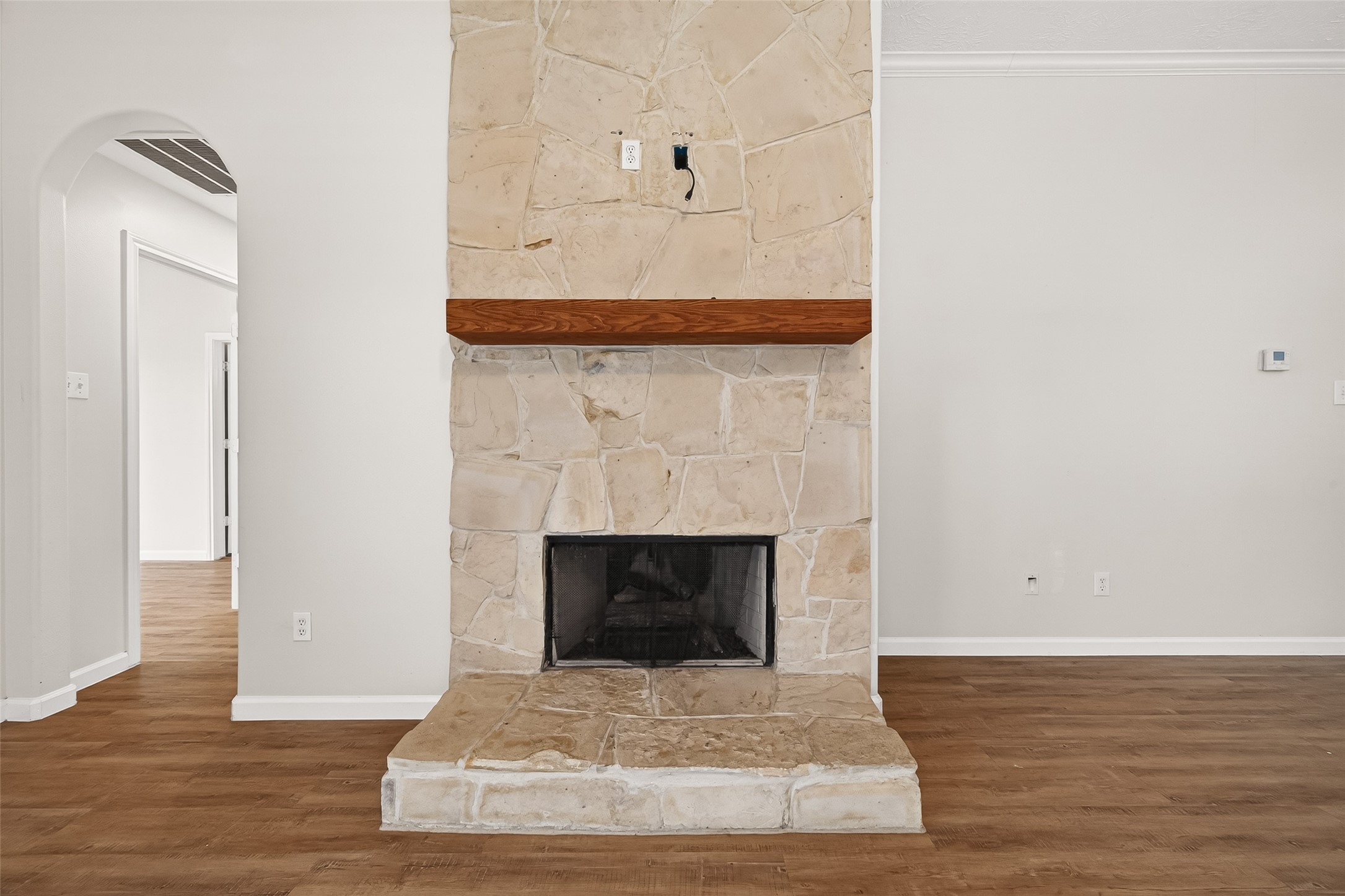 5517 Autumn Ash Lane Rosharon, TX 77583 - Photo 14 of 50 a living room with a fireplace and wooden floor
