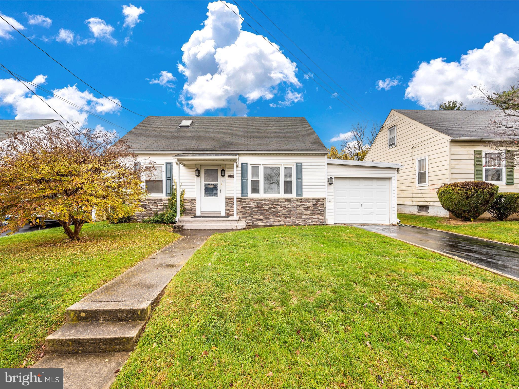 137 Devonshire Road Hagerstown, MD 21740 - Photo 2 of 41 a front view of a house with garden