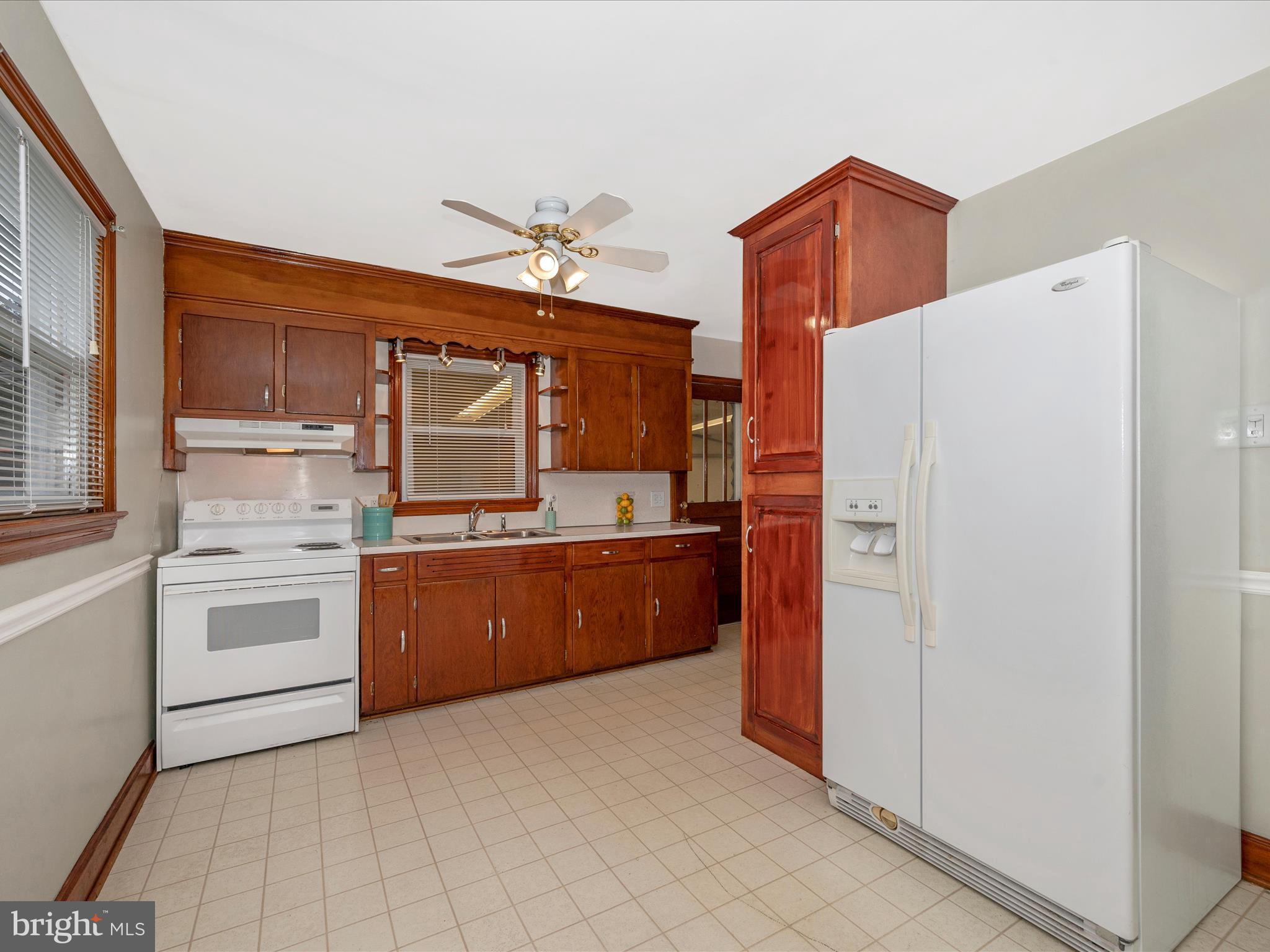 137 Devonshire Road Hagerstown, MD 21740 - Photo 9 of 41 a kitchen with a refrigerator and a stove