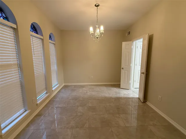a view of bathroom with dual sinks