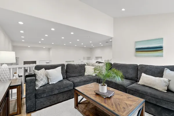 a living room with furniture and a couch