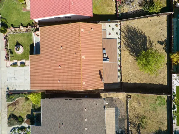 a view of a back yard with an outdoor space