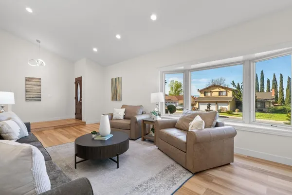 a living room with furniture and a couch