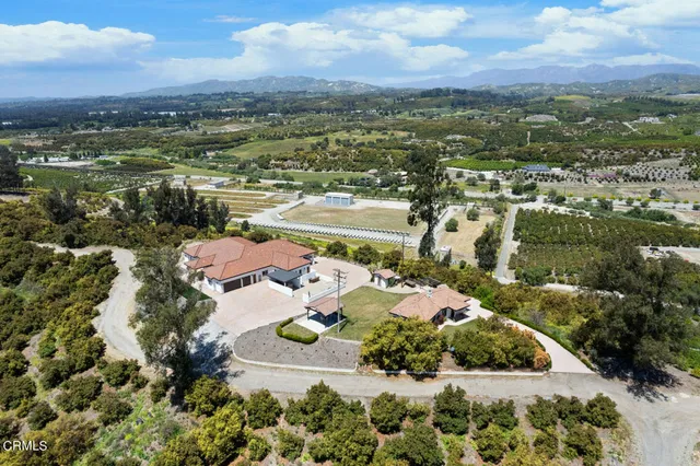 a view of a city with mountains in the background