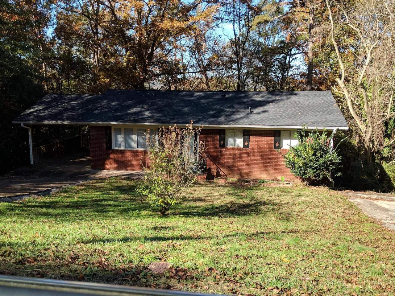 320 Alfred Avenue Southeast Rome, GA 30161 - Photo 1 of 1 a view of a backyard of the house