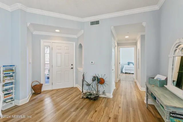 a kitchen with granite countertop a sink stainless steel appliances and cabinets