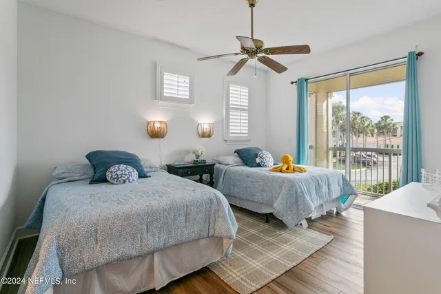 an aerial view of residential building and ocean