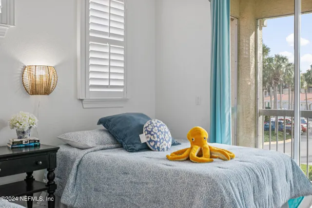 an aerial view of residential building and ocean