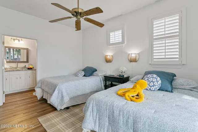 an aerial view of residential building and ocean