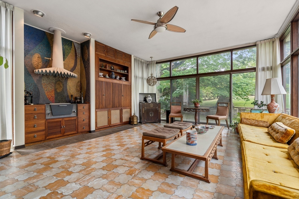 65 Lagrange Street Brookline, MA 02467 - Photo 11 of 39 a living room with furniture and a window