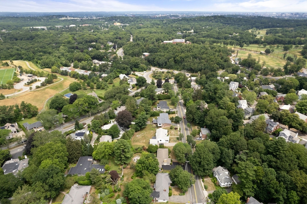 65 Lagrange Street Brookline, MA 02467 - Photo 24 of 39 an aerial view of town with residential houses with outdoor space and trees