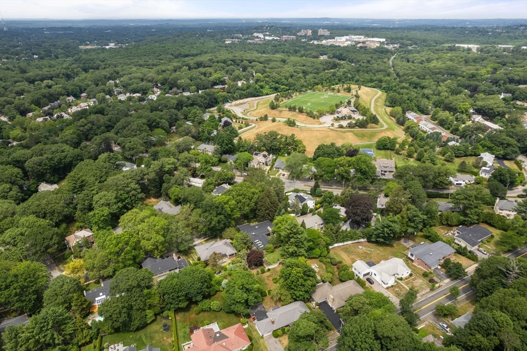 65 Lagrange Street Brookline, MA 02467 - Photo 26 of 39 an aerial view of a house with a yard