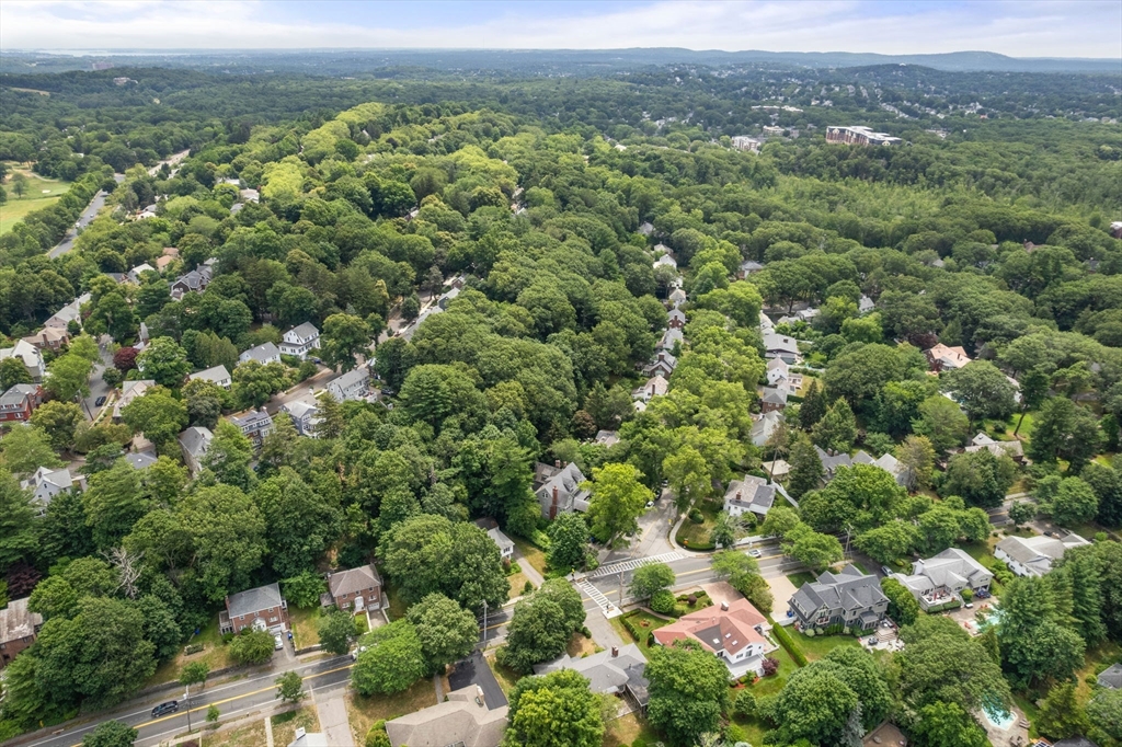 65 Lagrange Street Brookline, MA 02467 - Photo 30 of 39 an aerial view of a house with a yard