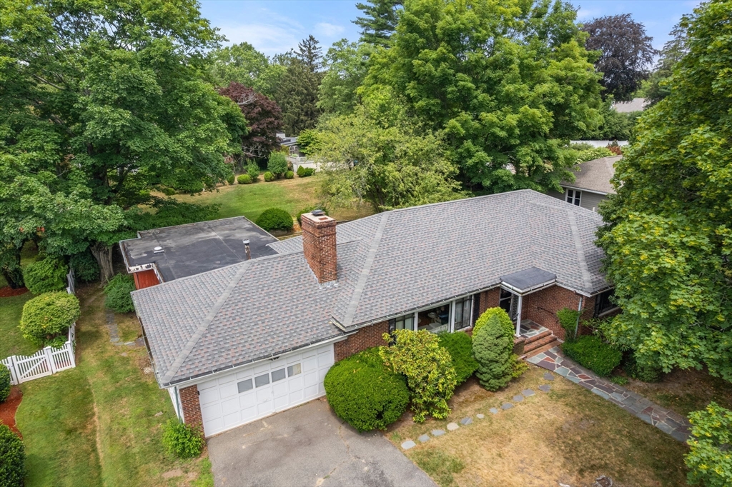 65 Lagrange Street Brookline, MA 02467 - Photo 37 of 39 an aerial view of a house with a garden and plants