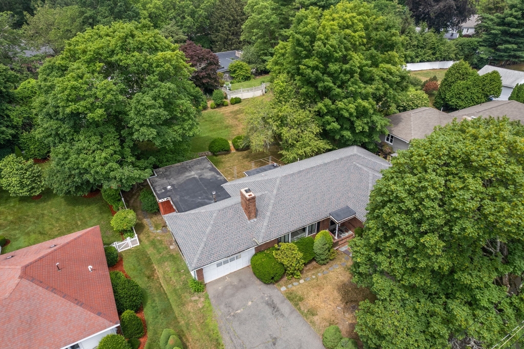65 Lagrange Street Brookline, MA 02467 - Photo 38 of 39 an aerial view of a house with a garden and lake view