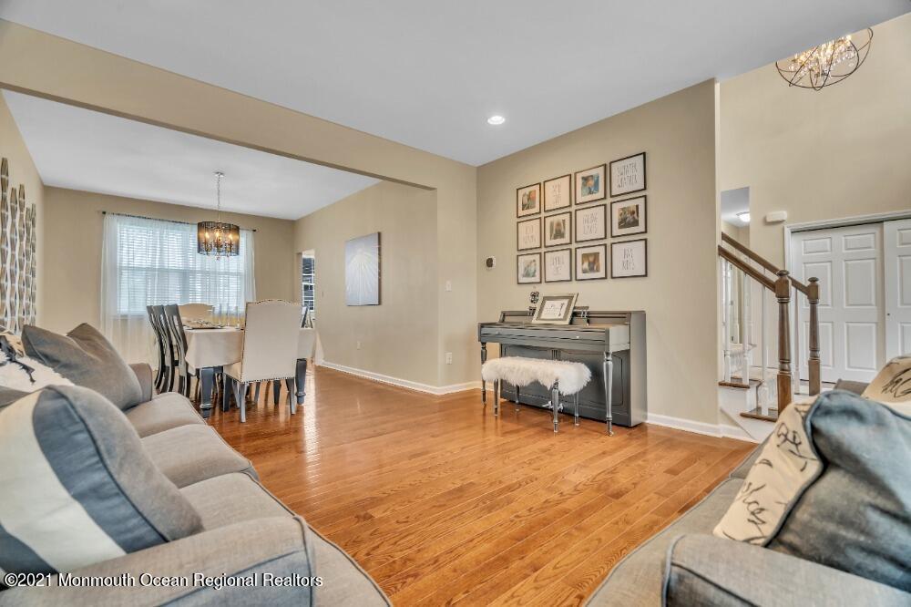 16 Bellagio Road Jackson, NJ 08527 - Photo 11 of 46 a living room with furniture and a table