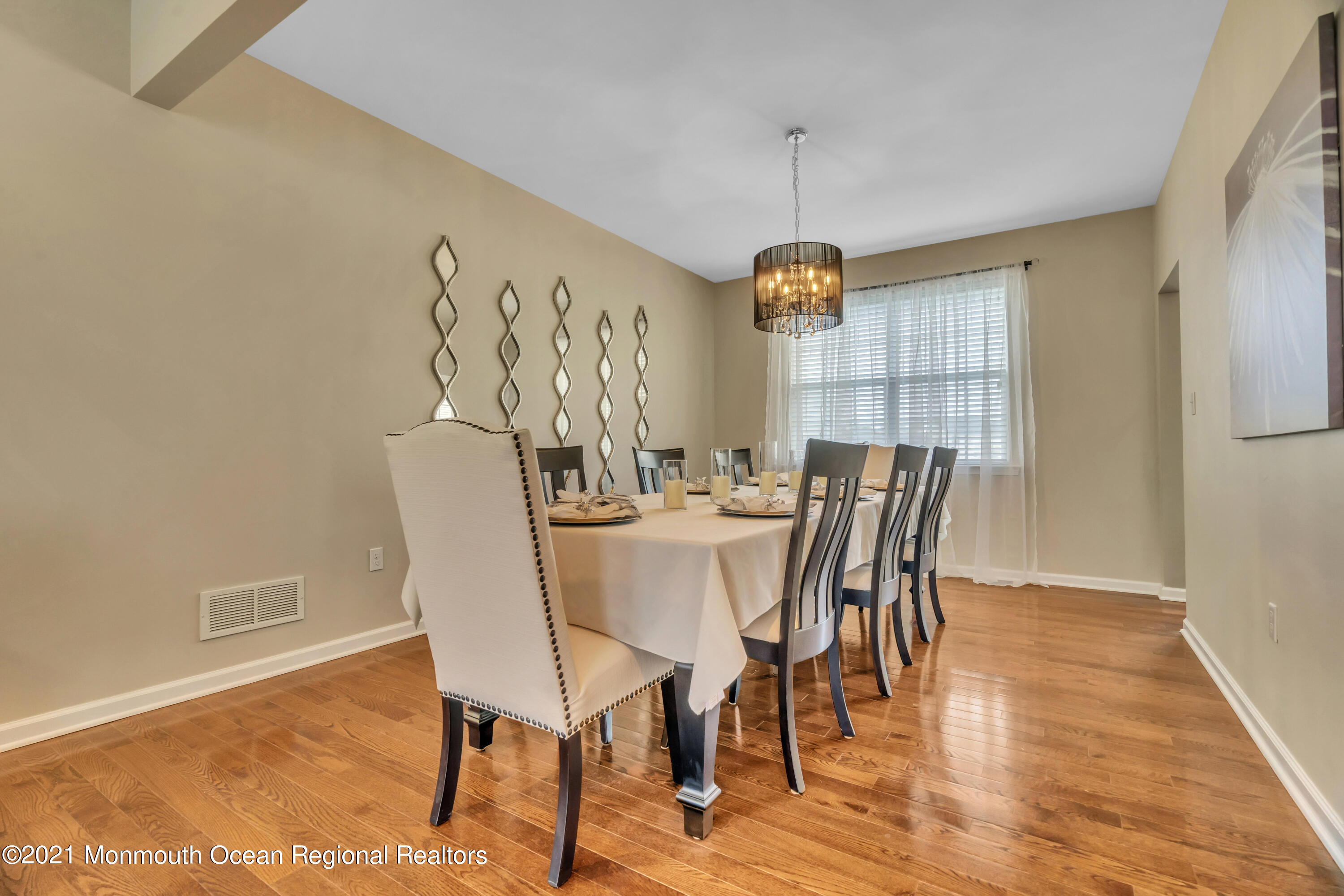 16 Bellagio Road Jackson, NJ 08527 - Photo 12 of 46 a view of a dining room with furniture window and wooden floor