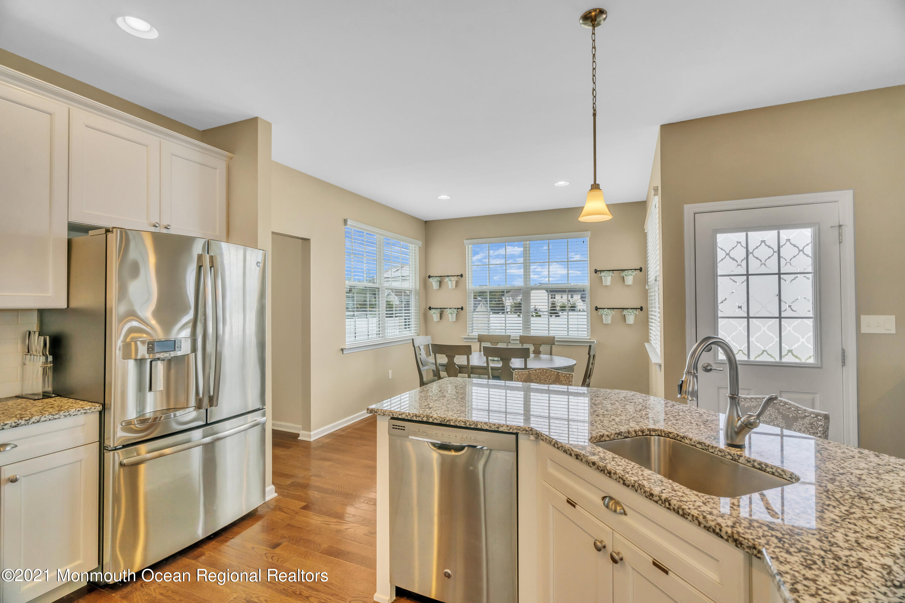 16 Bellagio Road Jackson, NJ 08527 - Photo 16 of 46 a kitchen with a refrigerator a sink and cabinets