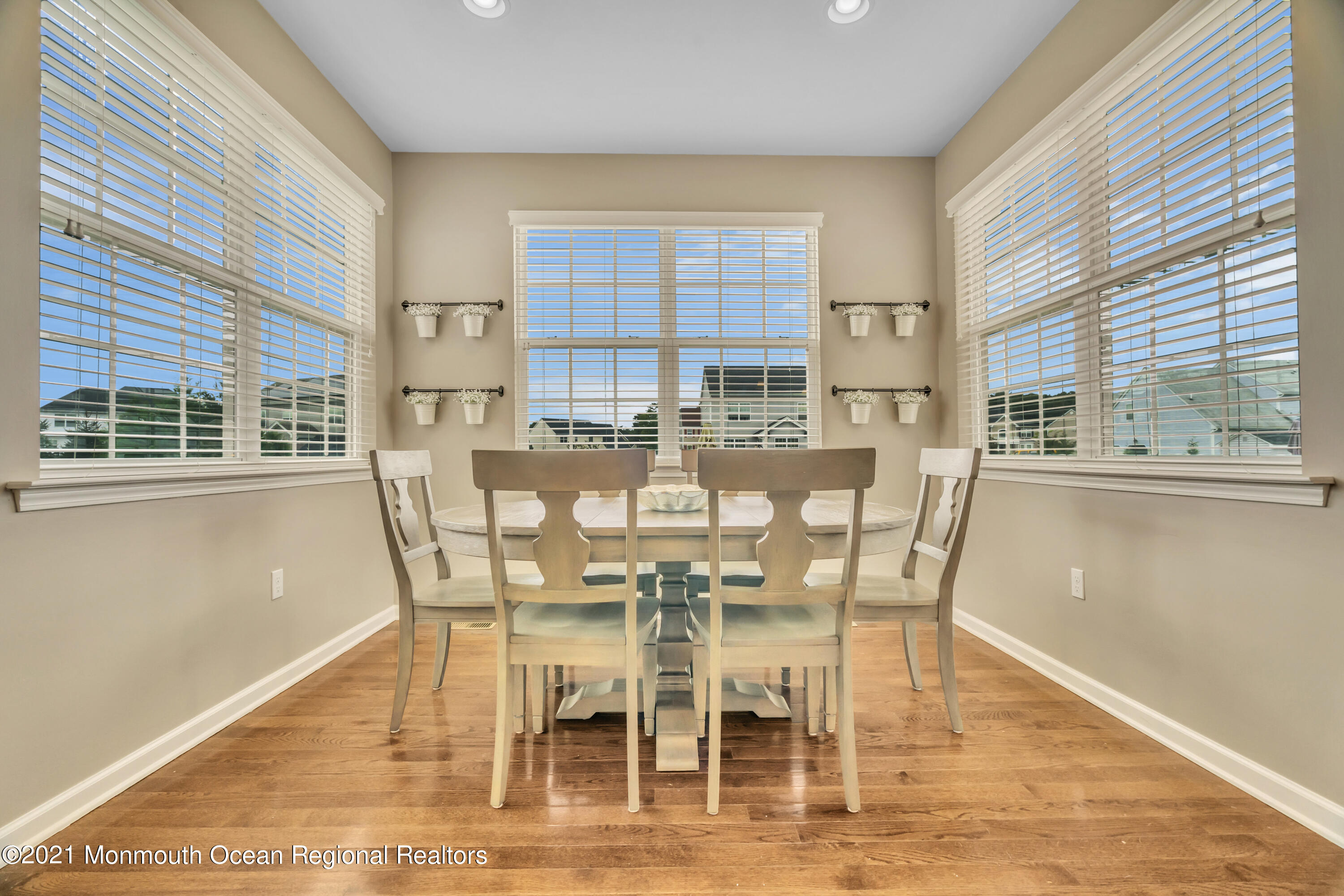 16 Bellagio Road Jackson, NJ 08527 - Photo 20 of 46 a dining room with furniture and window