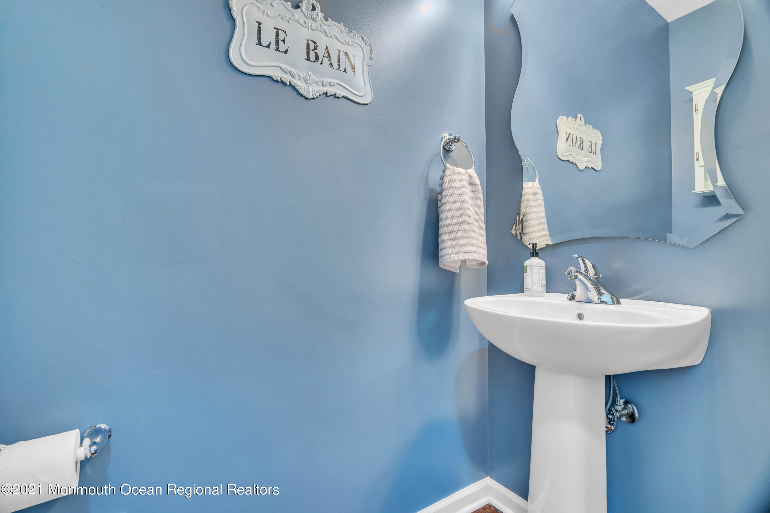 16 Bellagio Road Jackson, NJ 08527 - Photo 21 of 46 a bathroom with a sink and a mirror