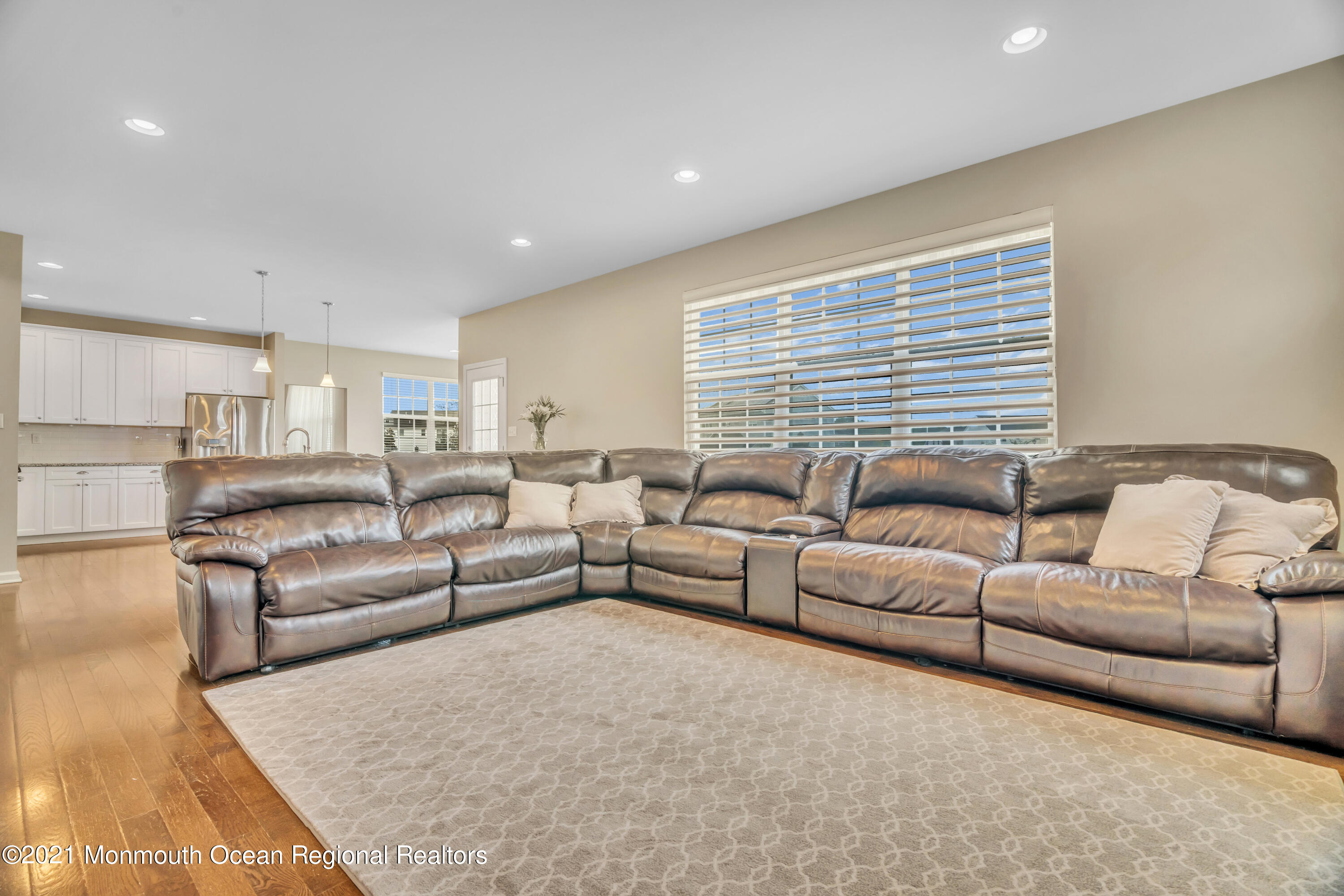 16 Bellagio Road Jackson, NJ 08527 - Photo 25 of 46 a living room with furniture and a large window