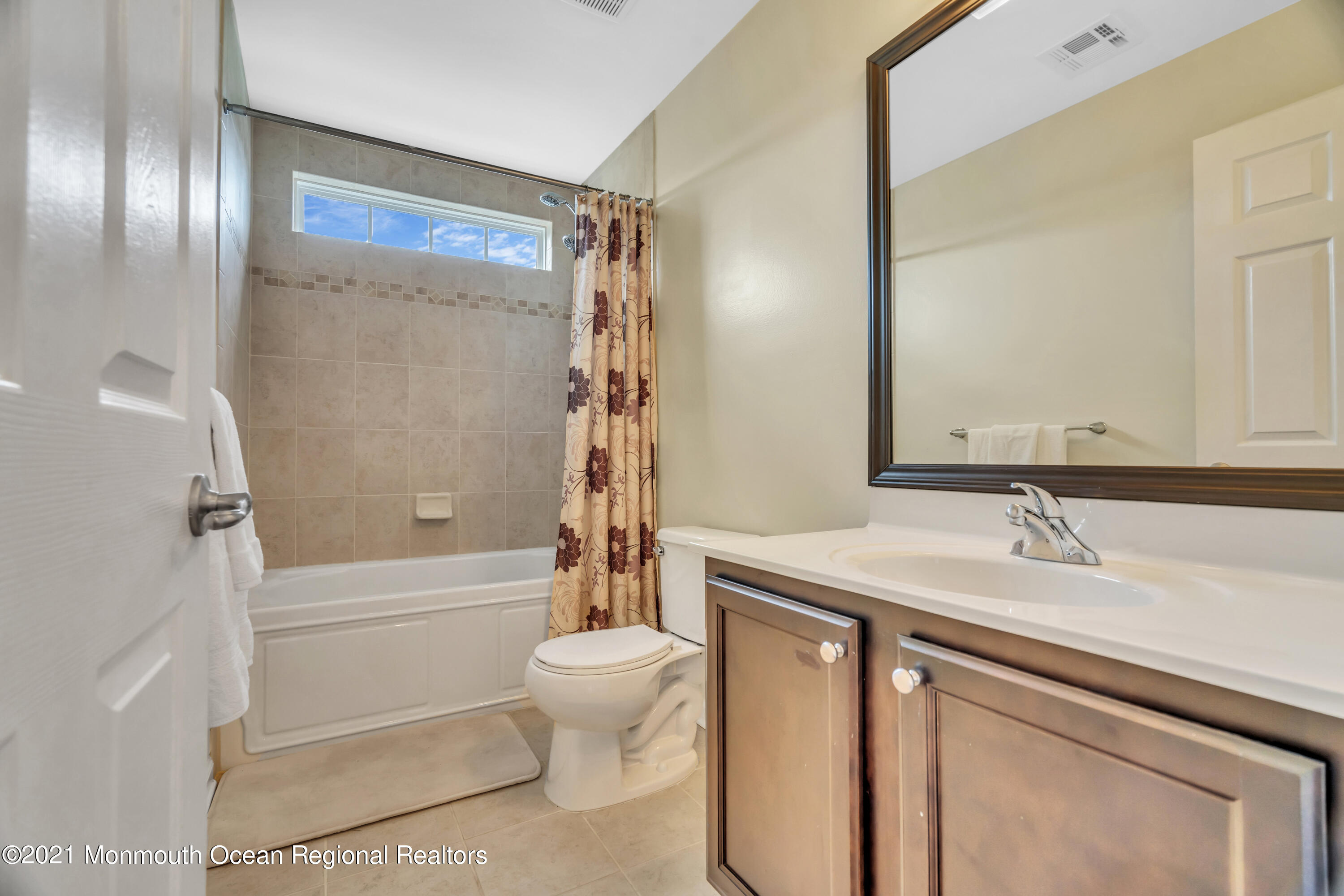 16 Bellagio Road Jackson, NJ 08527 - Photo 32 of 46 a bathroom with a sink toilet and shower