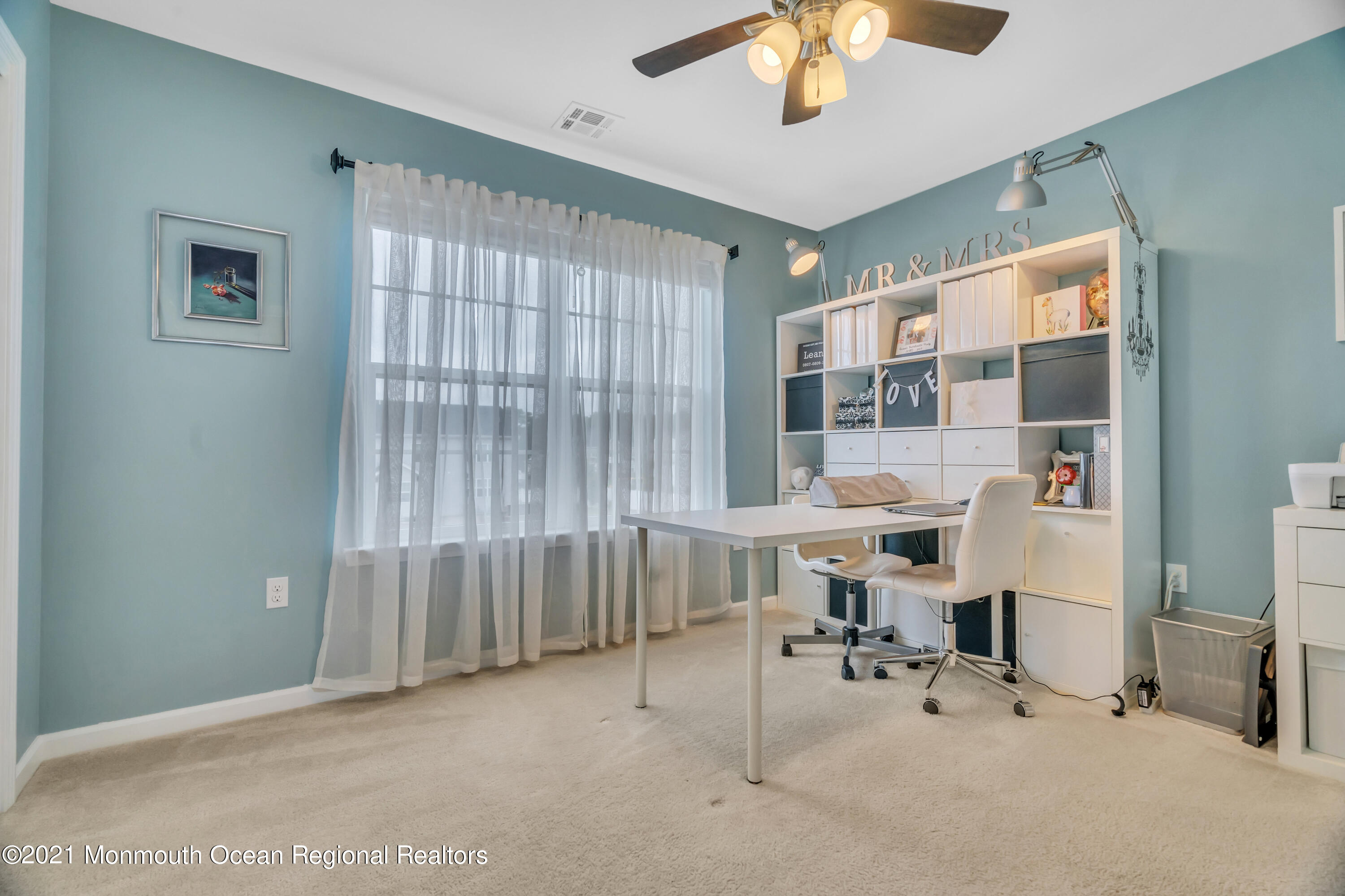 16 Bellagio Road Jackson, NJ 08527 - Photo 34 of 46 a view of a livingroom with furniture and a window