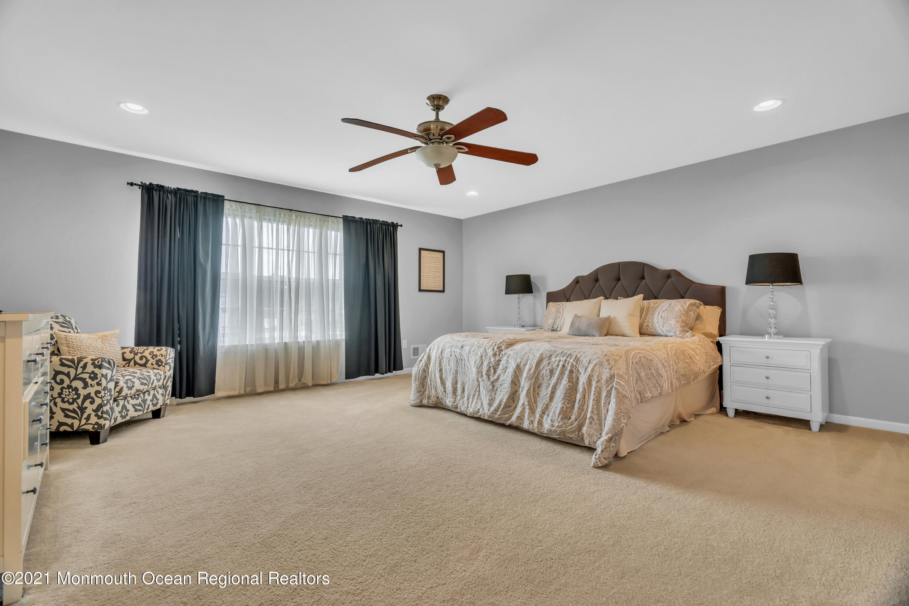 16 Bellagio Road Jackson, NJ 08527 - Photo 35 of 46 a bedroom with a bed and window