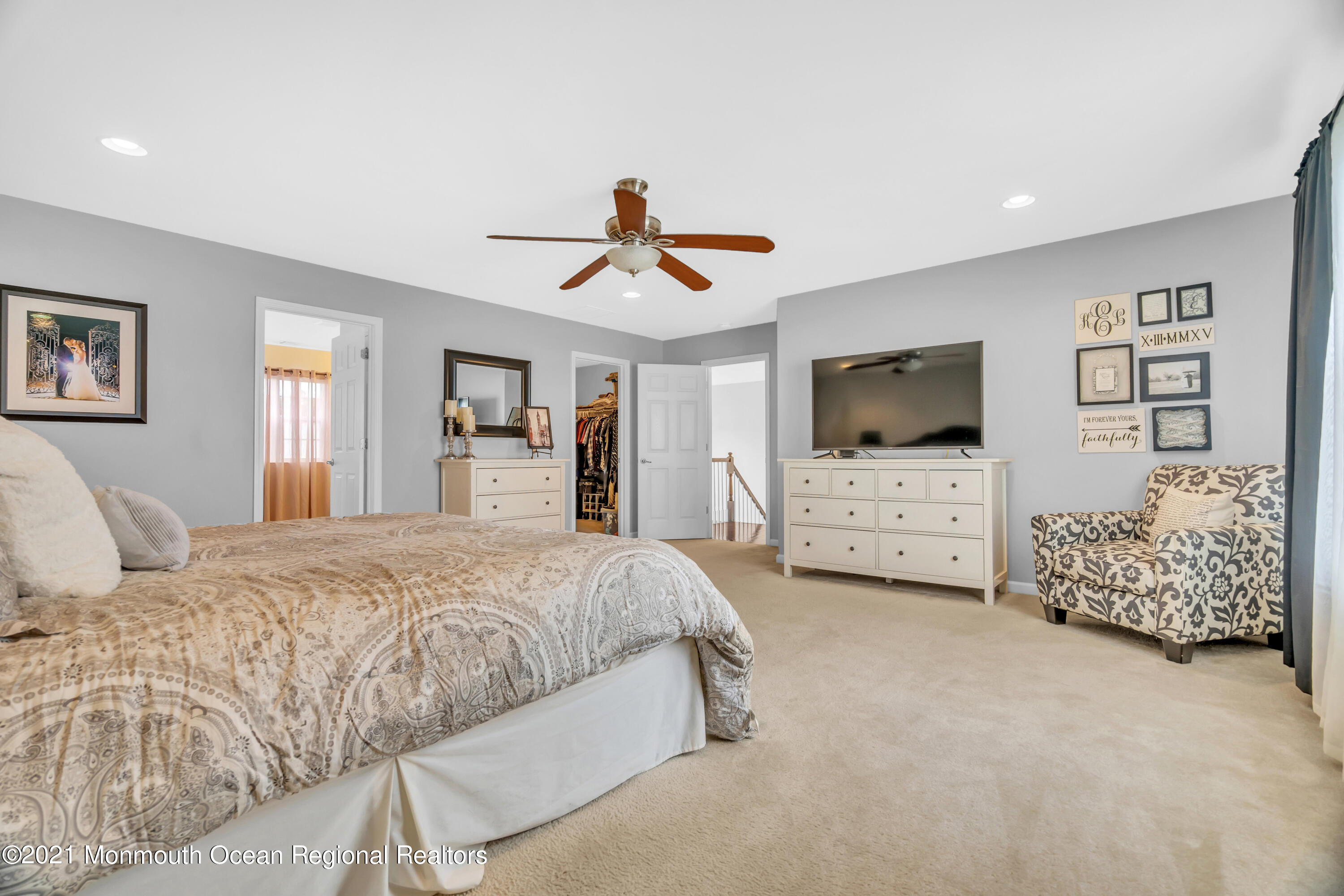 16 Bellagio Road Jackson, NJ 08527 - Photo 36 of 46 a spacious bedroom with a bed and a flat screen tv