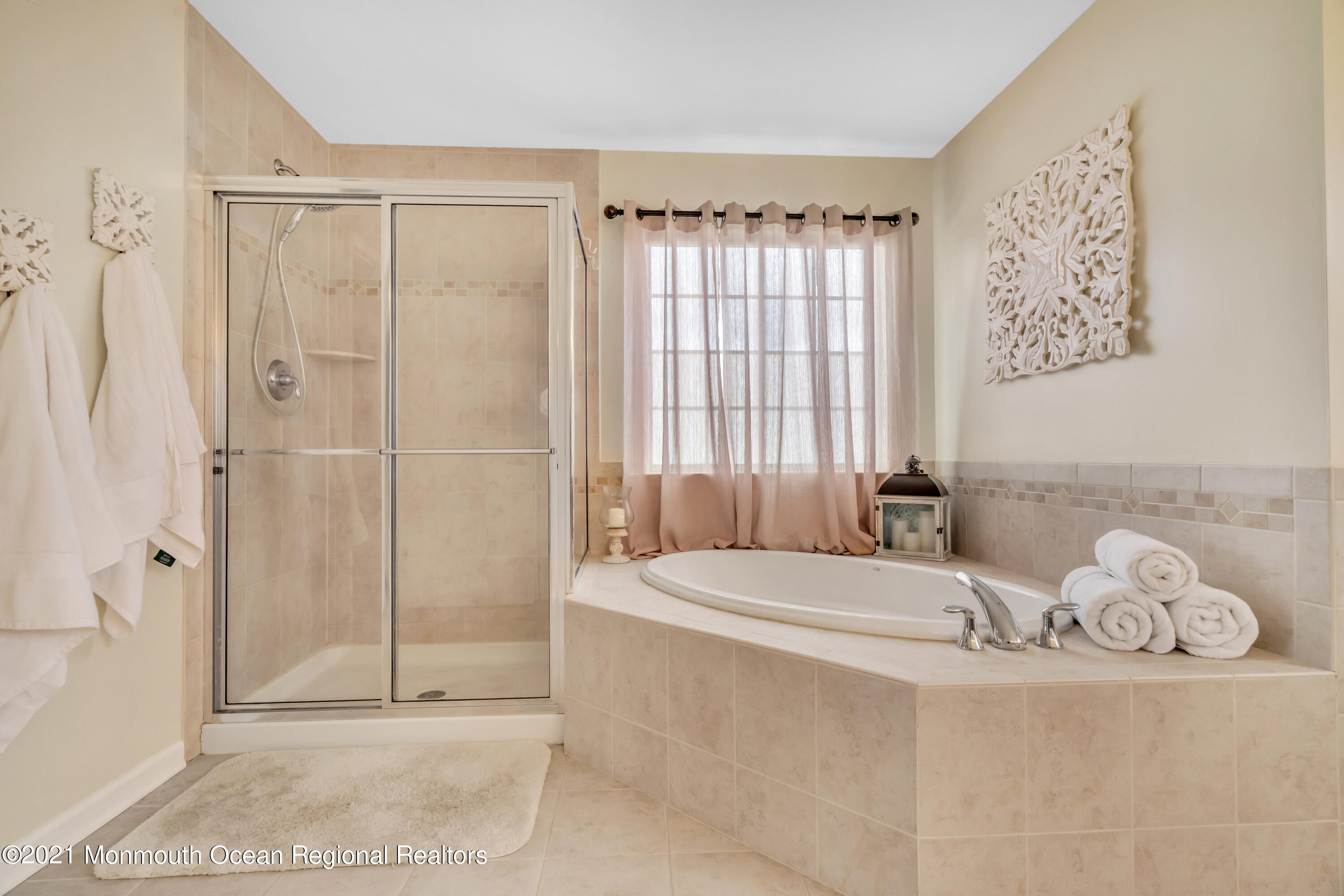 16 Bellagio Road Jackson, NJ 08527 - Photo 40 of 46 a bedroom with a bed and a window
