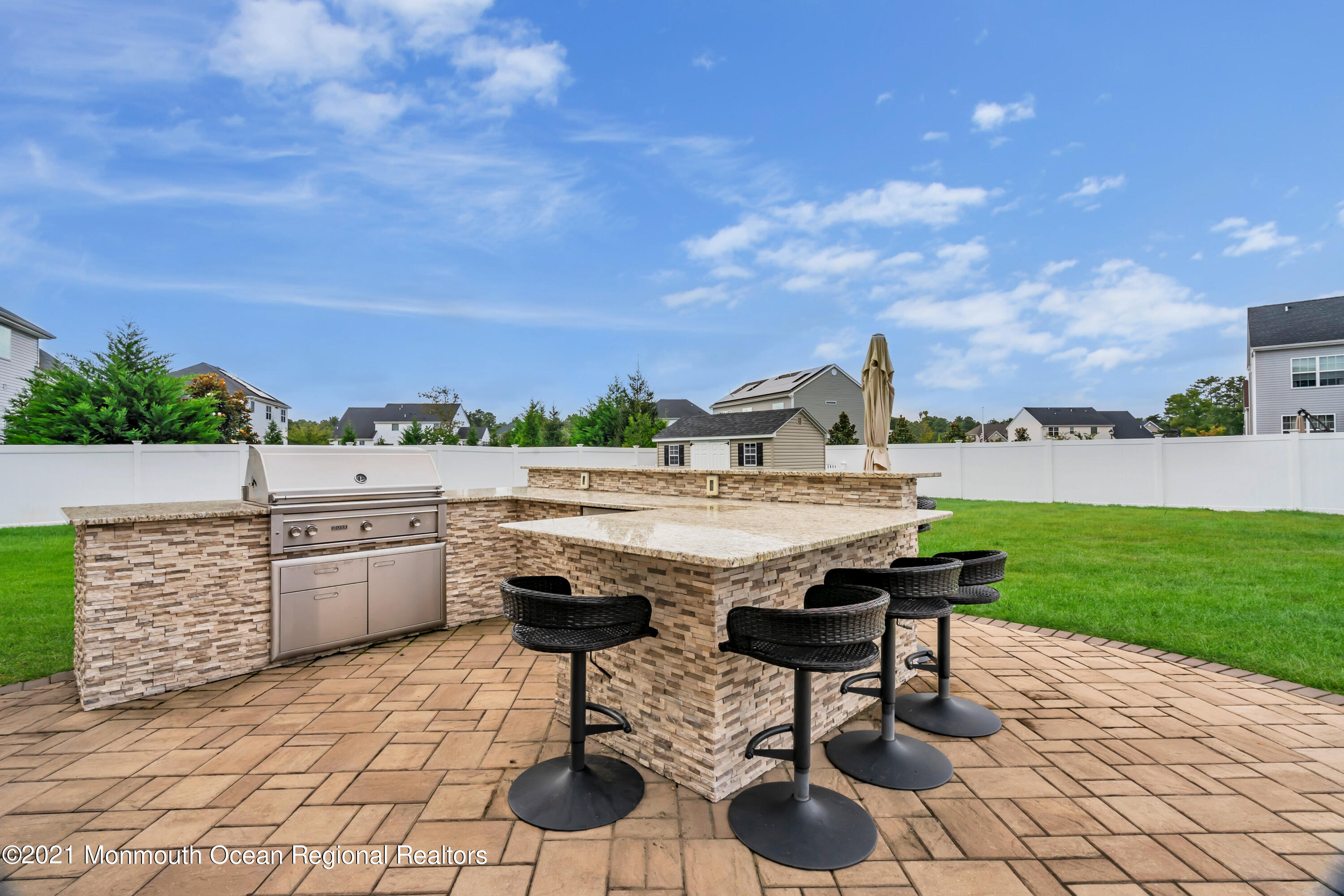 16 Bellagio Road Jackson, NJ 08527 - Photo 42 of 46 a view of swimming pool and outdoor seating