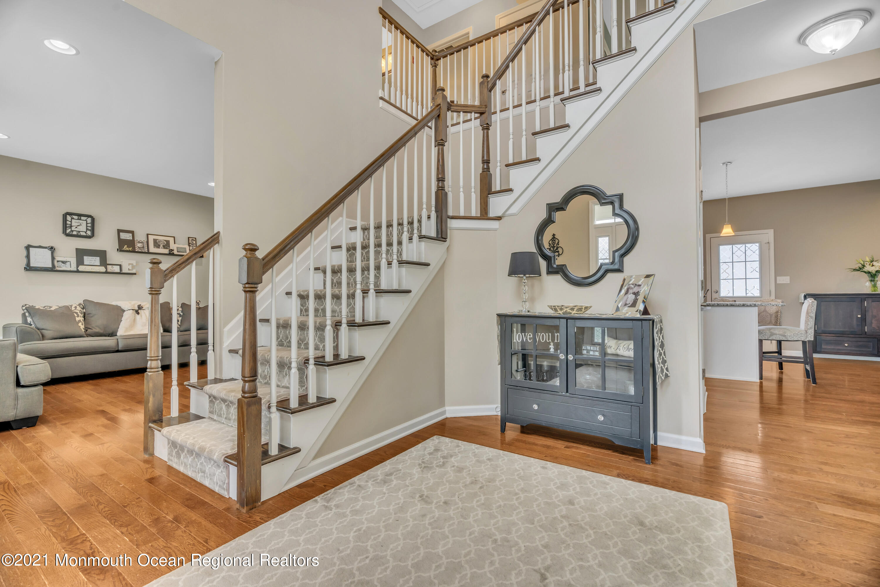 16 Bellagio Road Jackson, NJ 08527 - Photo 6 of 46 a view of entryway dining room and hall with wooden floor