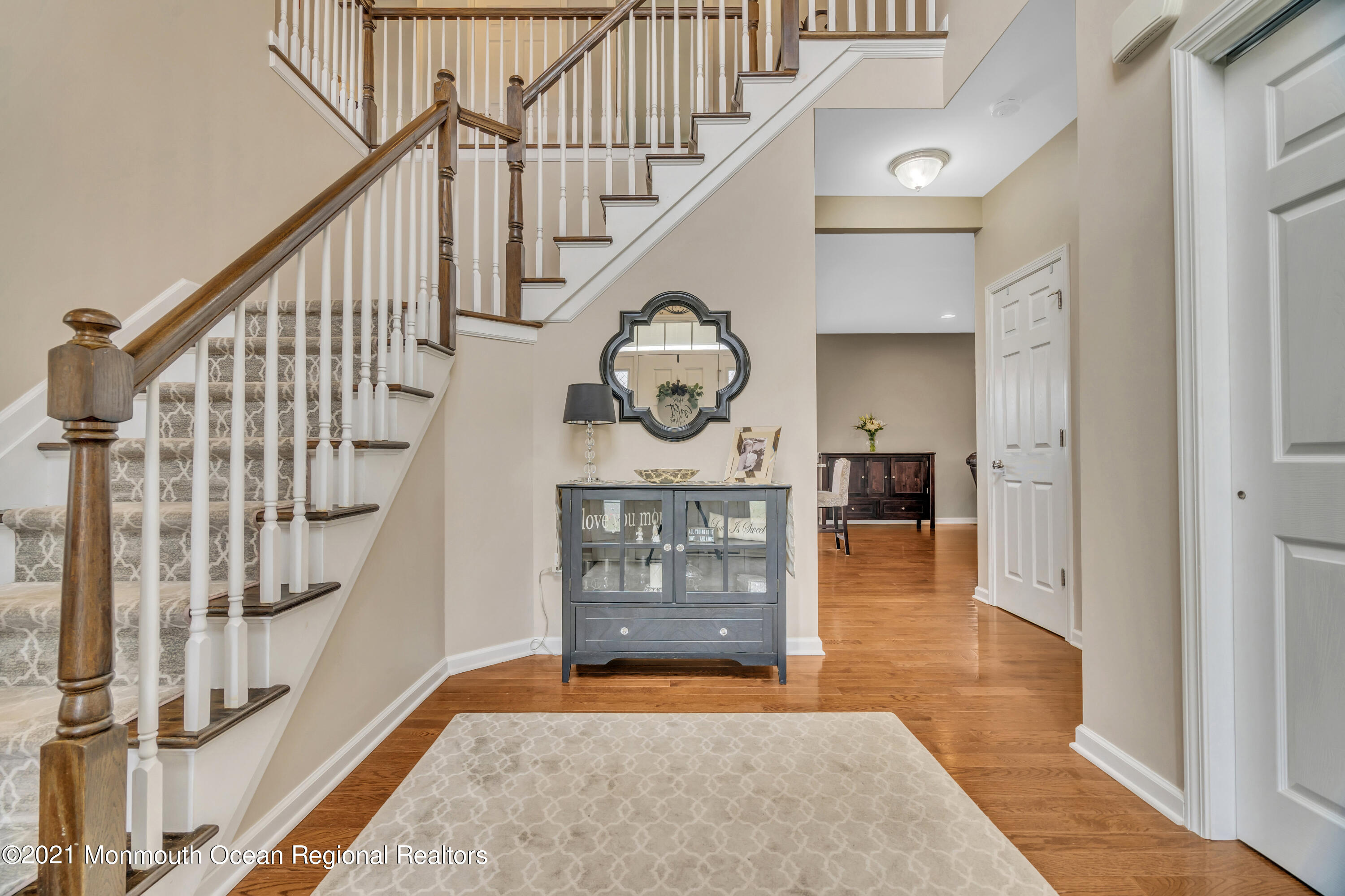 16 Bellagio Road Jackson, NJ 08527 - Photo 7 of 46 a view of entryway and hall with wooden floor